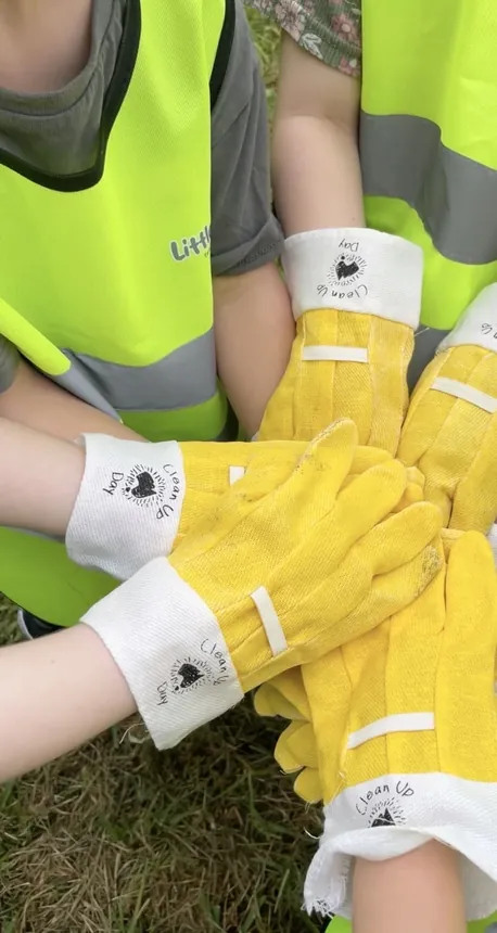 Children's hands together in Little Jungle excursion wristbands