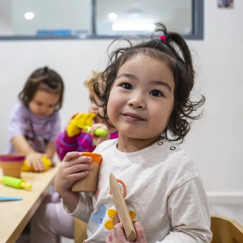 Parent saying goodbye at childcare drop-off, Little Jungle Dundas