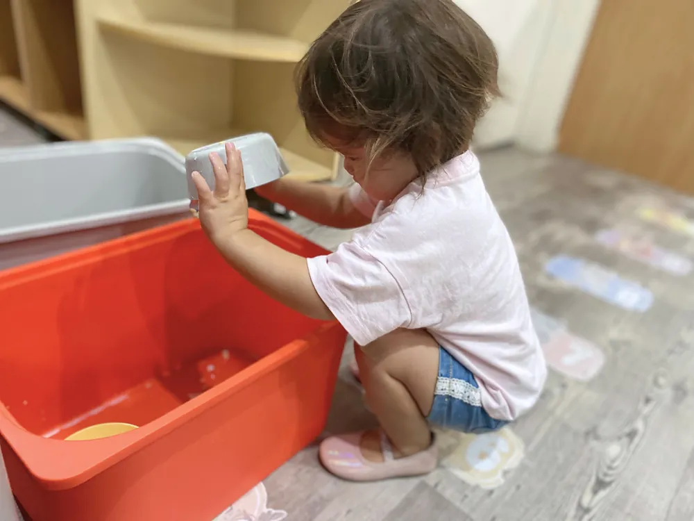 Child using Montessori-inspired materials at Little Jungle Early Learning, Dundas